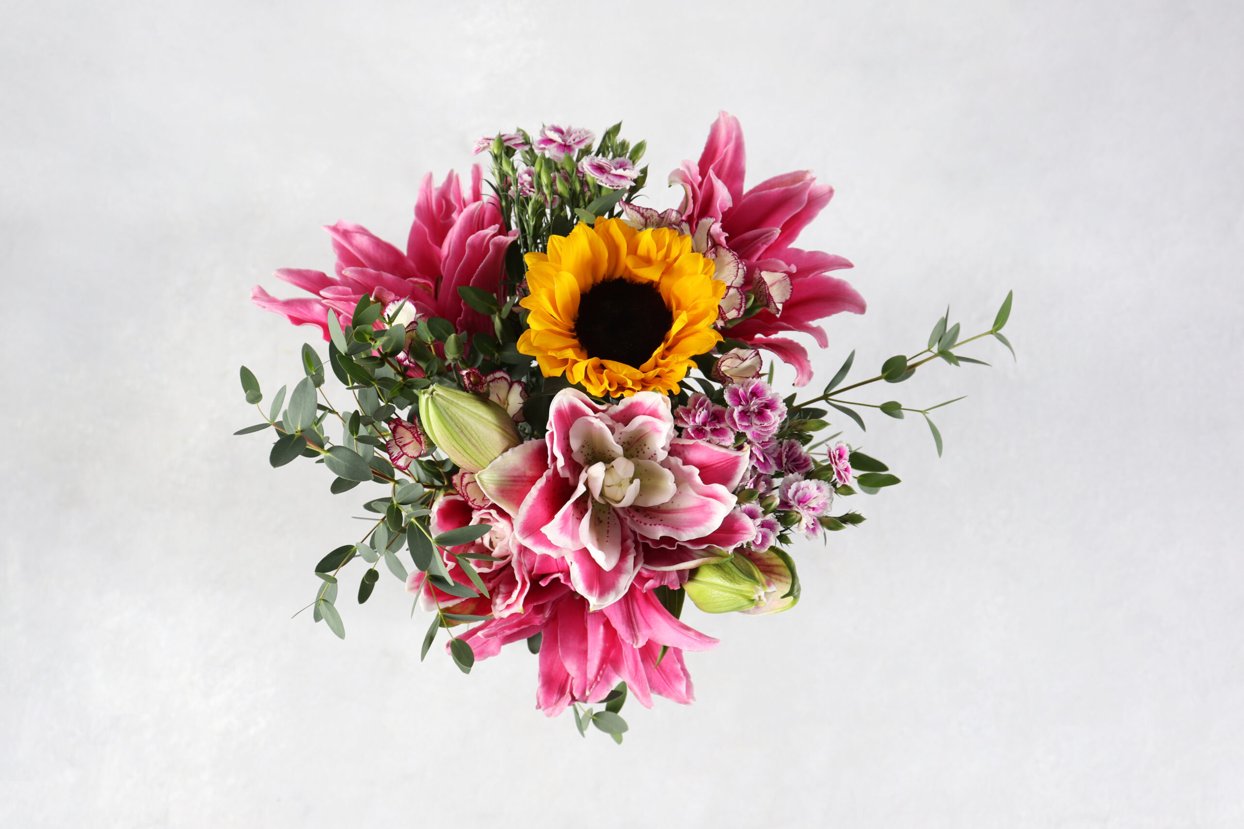 Rosy Bouquet, autumn bouquets, lilies and sunflowers.